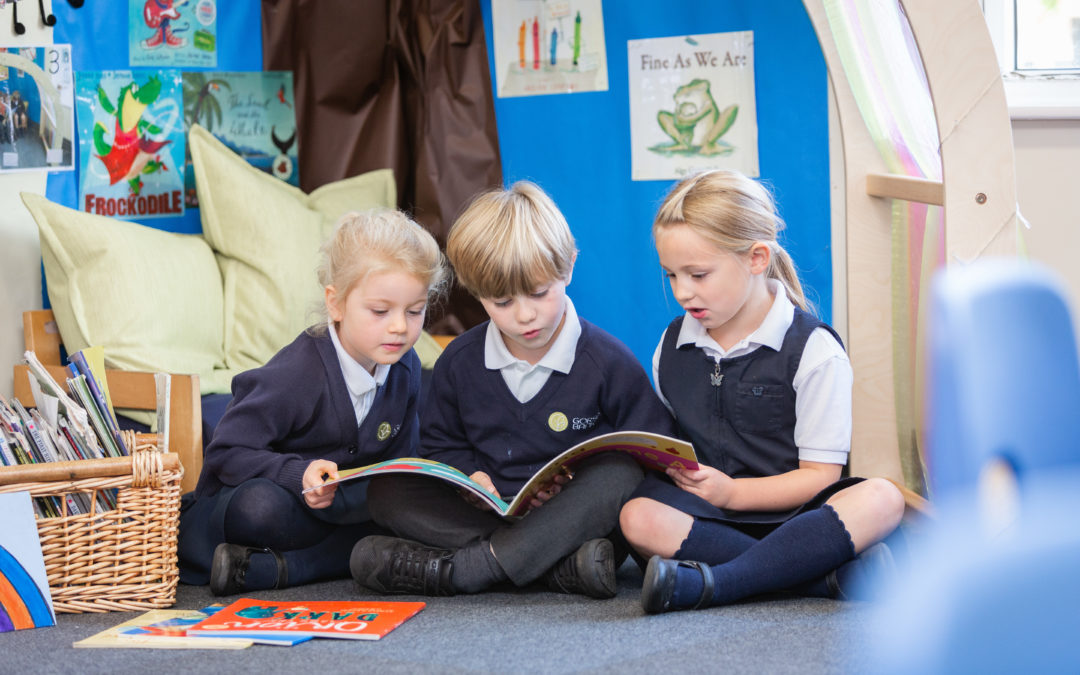 Pupils at Gorsey Bank Primary School carrying out a collaborative reading exercise.