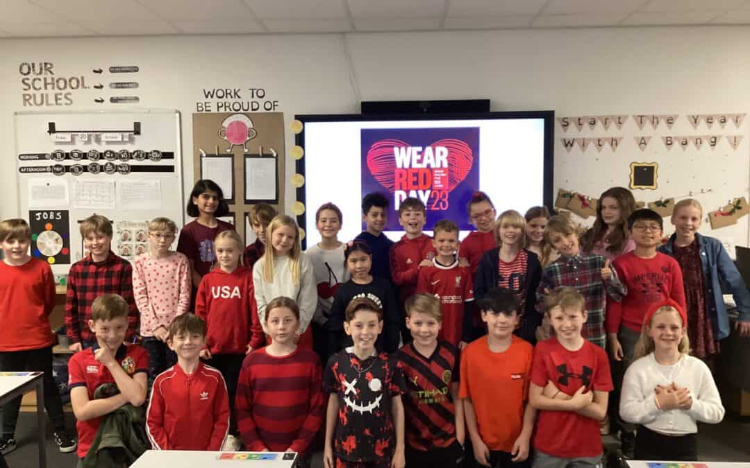 Gorsey Bank Primary School pupils wearing red for show racism the red card day.