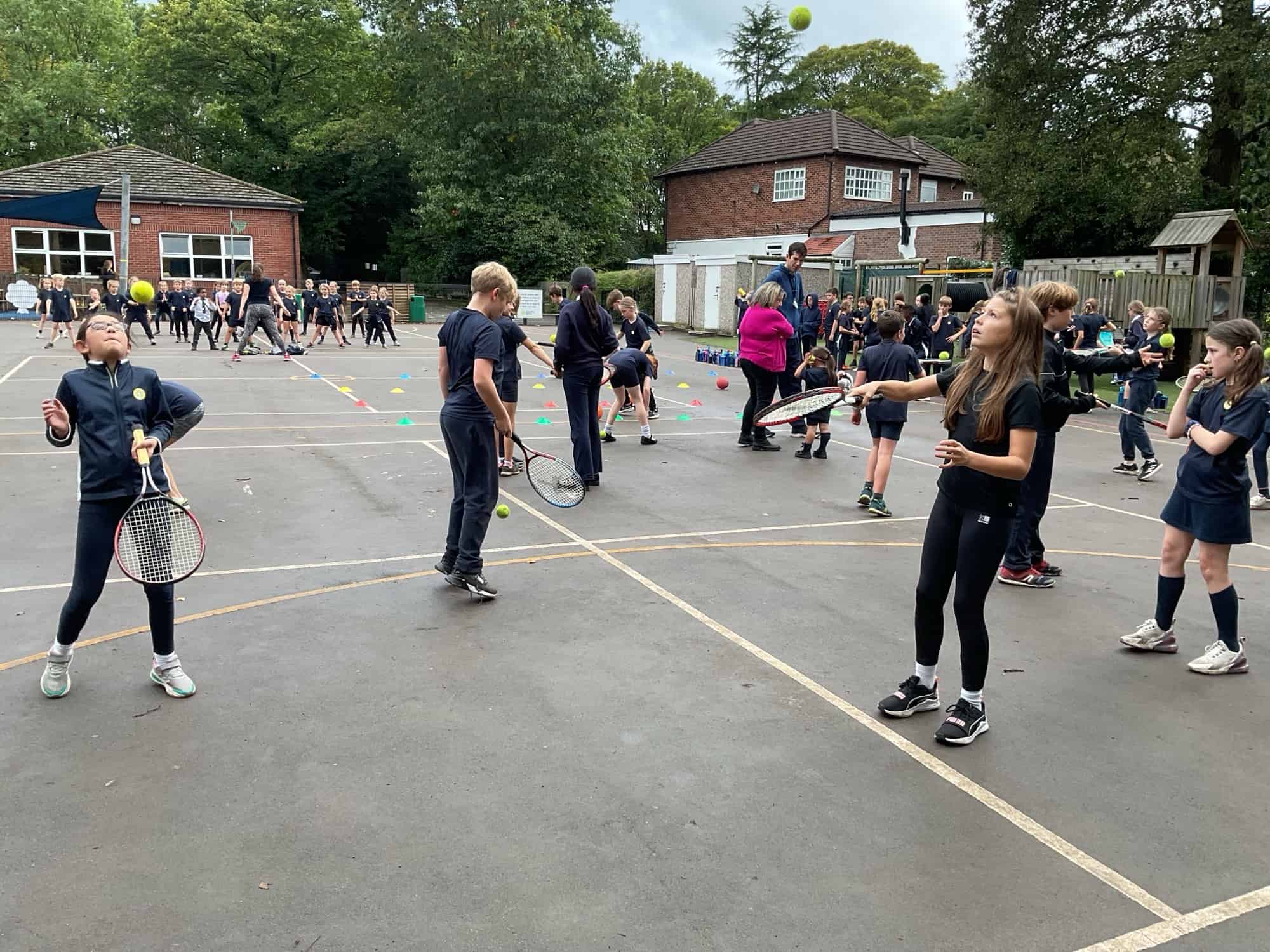 Gorsey Bank pupils playing tennis