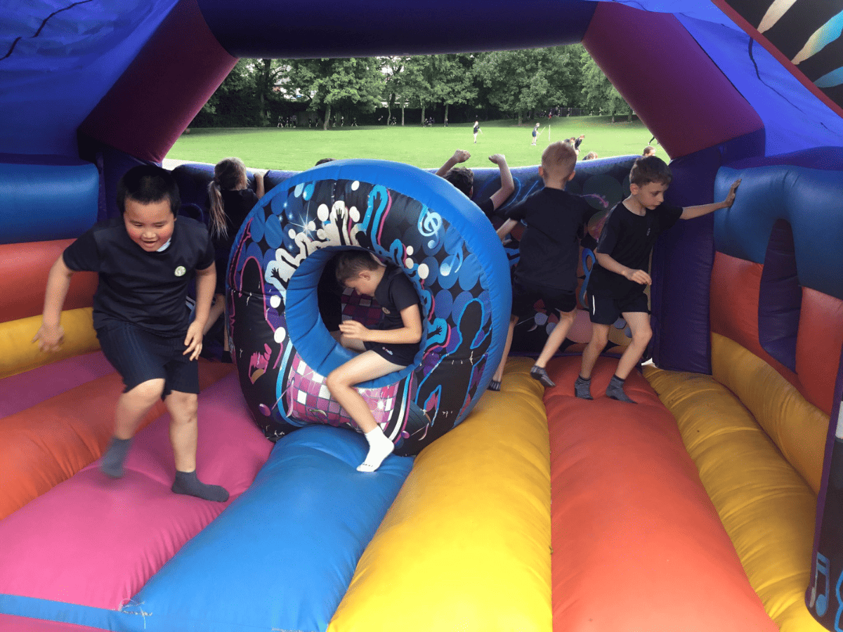 Gorsey Bank pupils enjoy playing on inflatables for their post OFSTED fun day.