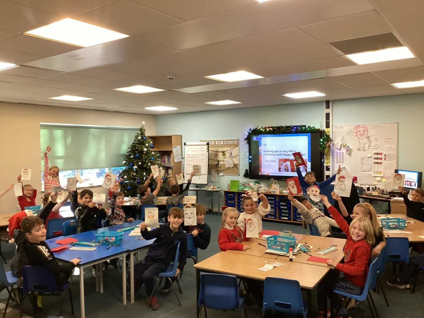 Year 4 show off their Christmas cards